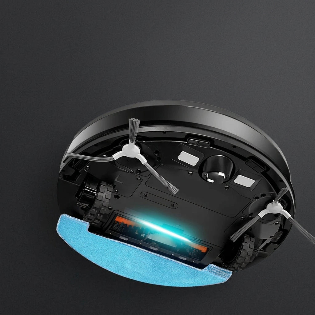 Dessous du robot : brosses latérales, serpillière et lampe UV